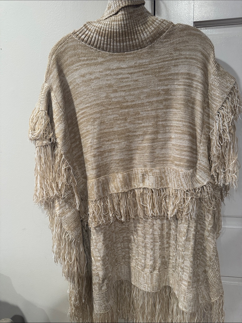 Like New New York & Company Cream Fringe Turtleneck Poncho Sweater. Size S/M